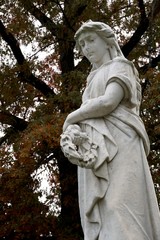 tombstones with angels and figures in victorian graveyard