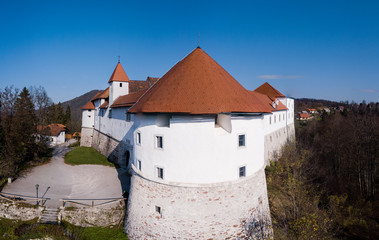 Turjak Castle ( grad Turjak or turjaški grad, German Burg Auersperg ) is a 13th-century castle located above the settlement of Turjak, Slovenia.