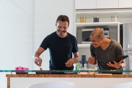 Gay Couple Preparing Brigadeiro Dessert at Home