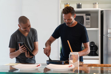 Gay Couple Cooking at Home
