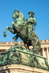 Statue of Prince Eugene of Savoy in front of Hofburg Palace in Vienna, Austria, sunny day, blue sky