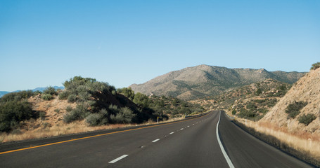 Scenic desert highway in Arizona with mountains