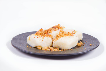 Dumplings with cottage cheese (traditional polish dish called lazy pierogi/ leniwe pierogi) fried with bread crumbs 