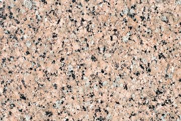 Natural stone granite texture. Pink and black color. Polished stone texture.