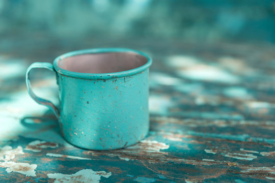 Rustic antique turquoise blue tin mug
