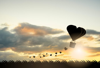 Heart air balloons Silhouette at sunset sky. Love and valentines day.