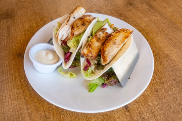 Fish Tacos Served in a Restaurant