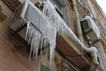 icy facade of the building in extreme winter frost