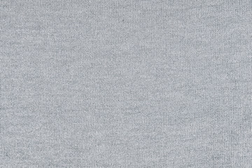 Fototapeta na wymiar Knitted gray texture of fabric