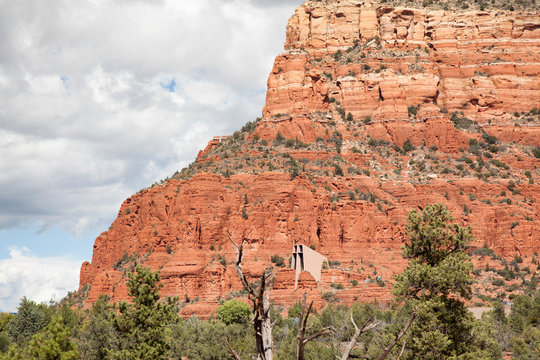 The Chapel of the Holy Cross is a Roman Catholic chapel built into the buttes of Sedona, Arizona, and is run by the Roman Catholic Diocese of Phoenix, as a part of St. John Vianney Parish in Sedona.