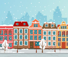 Fototapeta premium Vector illustration of european winter town. Flat design. Old houses.