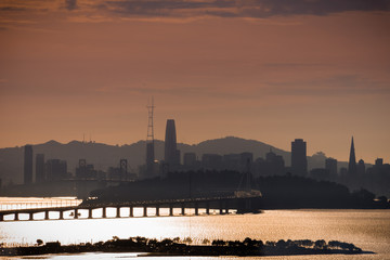 San Francisco's Financial District new skyline as seen at sunset from across the bay