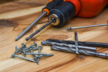 Close up Electric drill, Drill set, Screwdriver set. A set of home craftsmen for woodwork.