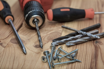 Close up Electric drill, Drill set, Screwdriver set. A set of home craftsmen for woodwork.
