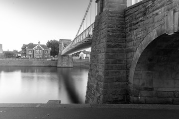 Long Exposure of Bridge in Nottingham, UK, with reflecting lights and embankment