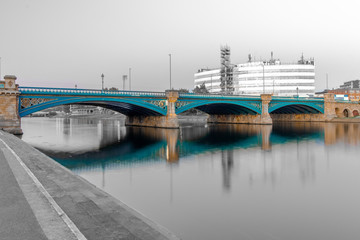 Long Exposure of Bridge in Nottingham, UK, with reflecting lights and embankment