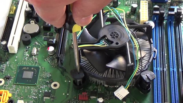 Technician Remove Fan Cpu Microprocessor From A Motherboard Socket