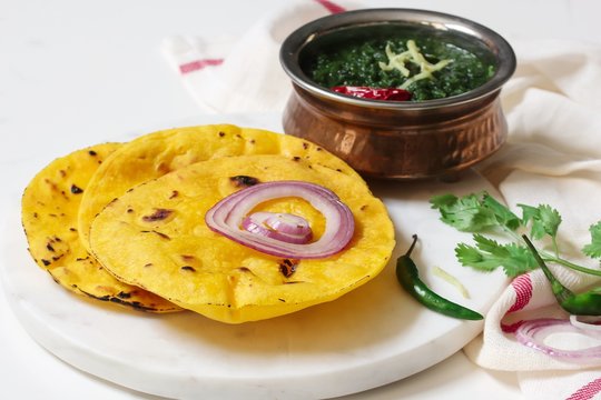 Sarson ka saag and Makki ki roti /Indian corn bread with mustard leaves gravy