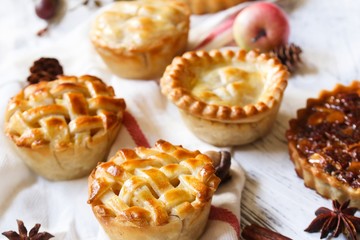 Background with various mini muffin pies / Thanksgiving desserts frame