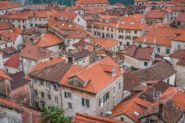 Fototapeta na wymiar Red tiled roofs of Kotor Old town houses