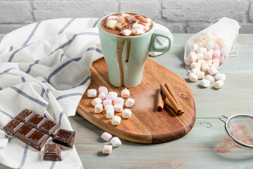 Winter hot drink. Hot chocolate or cocoa with marshmallow and spices