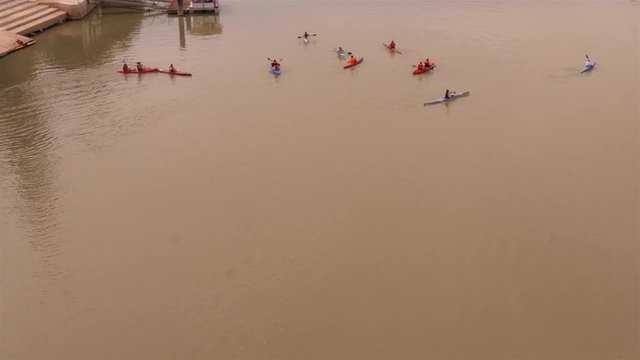 Kayaks padling on the Ebro river in Zaragoza, Aragon, Spain &ndash; medium wide