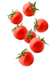 Falling tomato cherry isolated on white background, clipping path, full depth of field