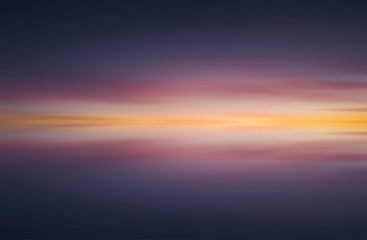 Reflection of colorful abstract sunset background - Stock image