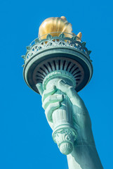 Detail of Statue of Liberty against blue sky in New York City