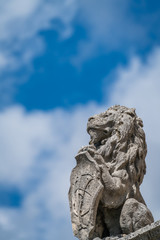 Fototapeta na wymiar Ancient lion statue in Perast