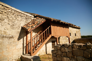 Obraz premium The entrance is with an old building made of large stone blocks. Crimean peninsula.