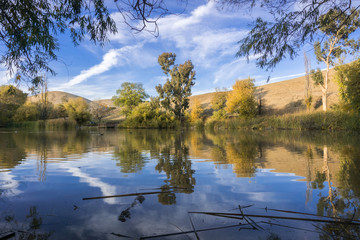Pond and surrounding hills at sunset, Garin Dry Creek Pioneer Regional Park, San Francisco bay, California