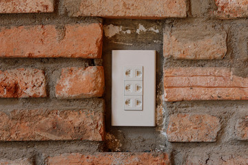 Plug on brick wall