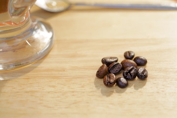 Some coffee beans on a table