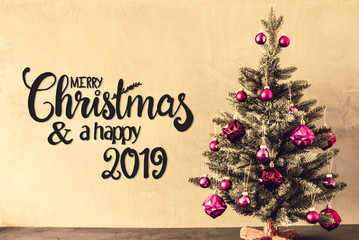 Obraz na płótnie Canvas Tree With Purple Balls, Calligraphy Merry Christmas And A Happy 2019