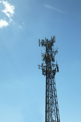 Communication pole line in blue sky