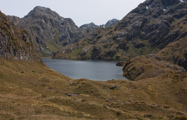 Lake Harris near Harris Saddle at the Routeburn Great Walk in Fiordland, New Zealand