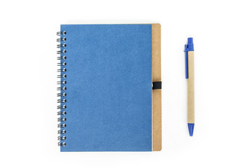 notebook and pen on white background.