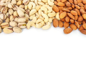 mix almond and pistachio and cashew on white background
