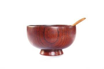 bowl and spoon wooden on white background.