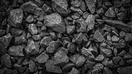 rubble texture natural abstract dark black and white vignette background close-up