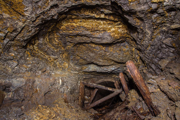 Underground abandoned gold iron ore mine shaft tunnel gallery passage