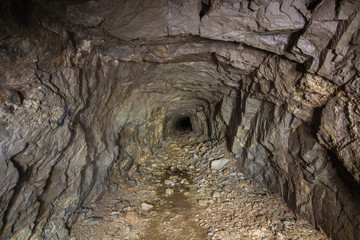 Underground abandoned gold iron ore mine shaft tunnel gallery passage