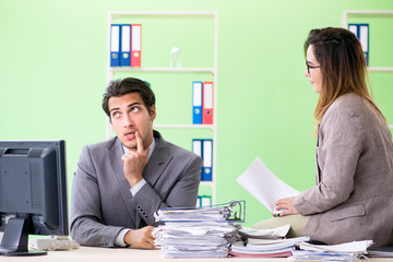 Two colleagues working in the office