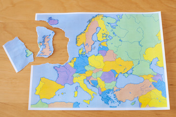 Torn paper map symbolizing the UK leaving the European Union or Brexit