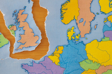 Torn paper map symbolizing the UK leaving the European Union or Brexit