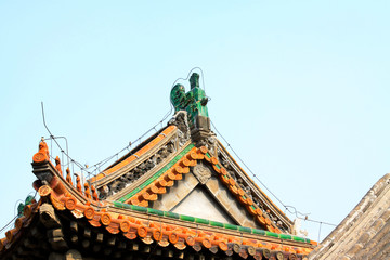 Temple eaves and beast sculpture