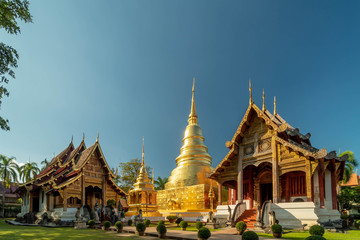 Fototapeta premium Wat Phra Singh temple with blue sky Chiang Mai Thailand