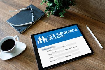 Life insurance online application form on device screen.