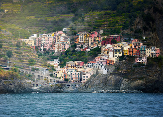 Fototapeta na wymiar Beautiful colorful cityscape on the mountains over Mediterranean sea, Europe, Cinque Terre, italy